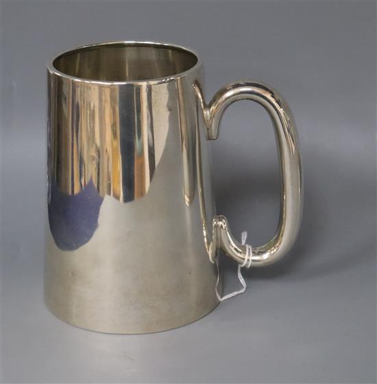 A George V silver pint mug, with glazed base, Robert William Jay, Chester, 1931, 12.8cm.